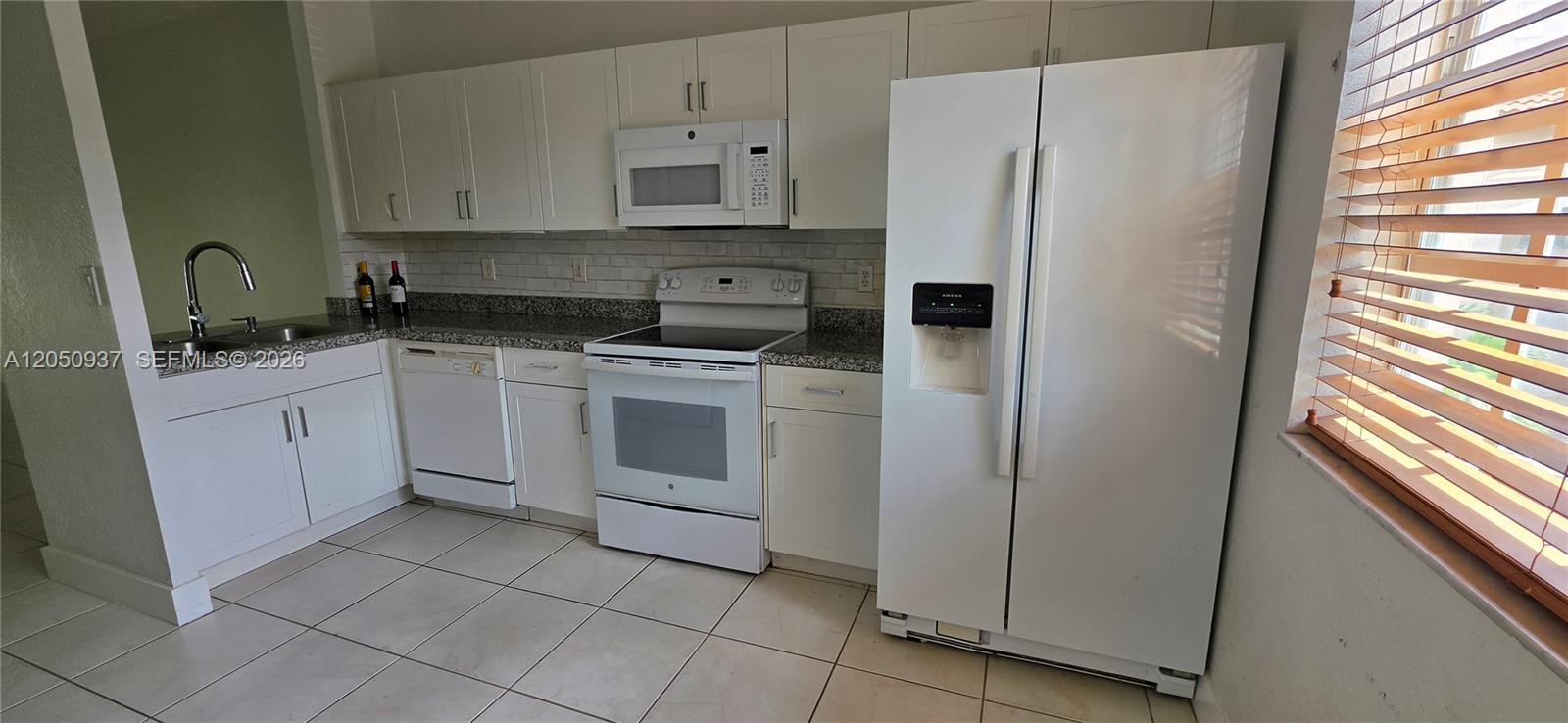 5670 NW 116th Ave # 220, Doral FL 33178 photo 2