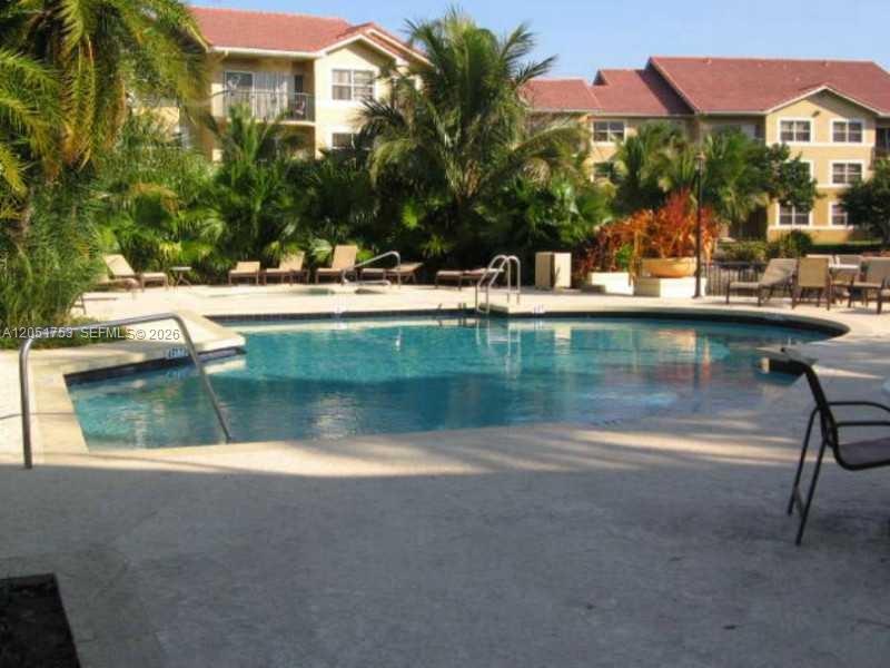 8821 Wiles Rd # 107, Coral Springs FL 33067 photo 2