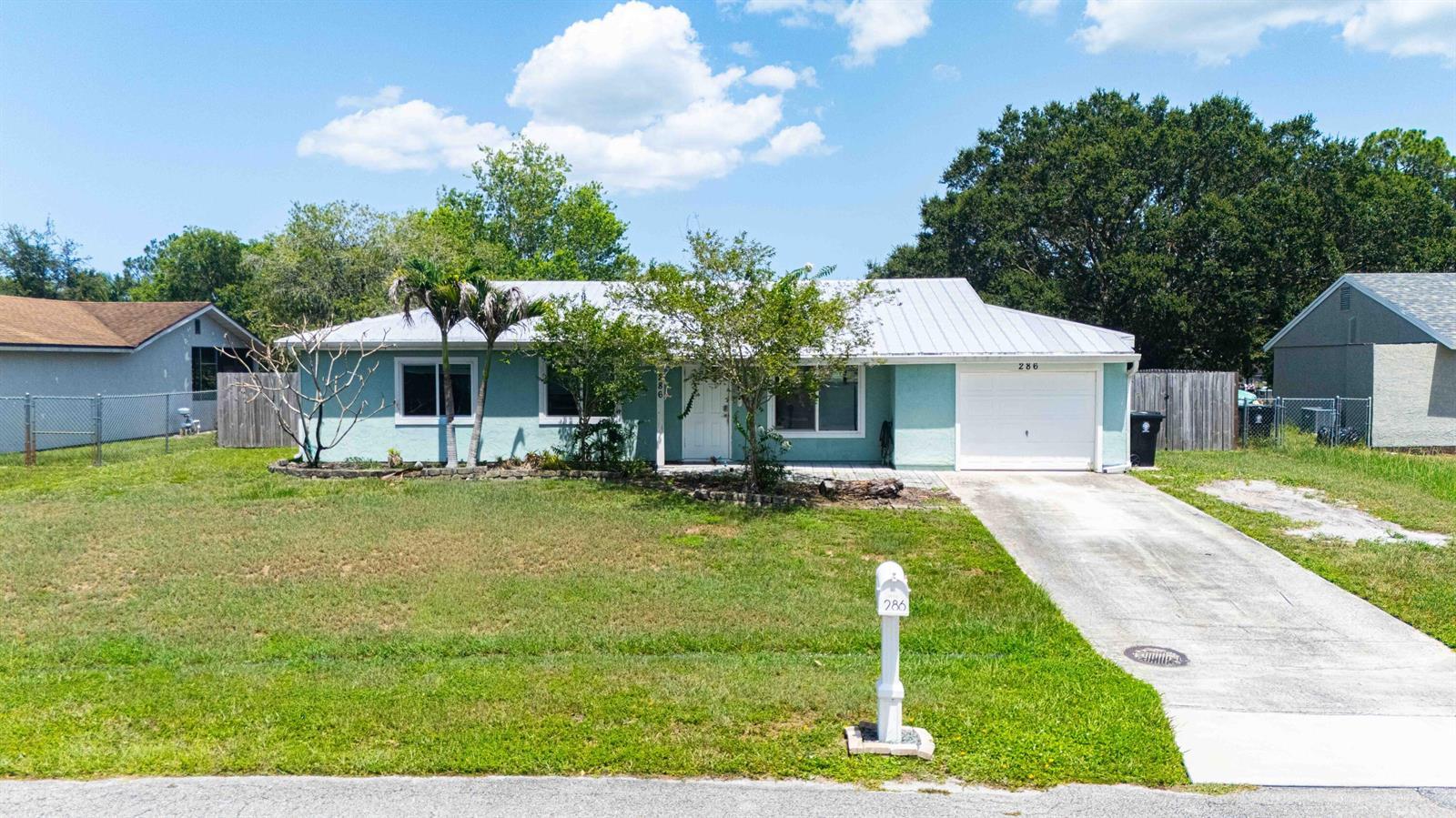 286 SW KENTWOOD Road, Port St. Lucie FL 34953