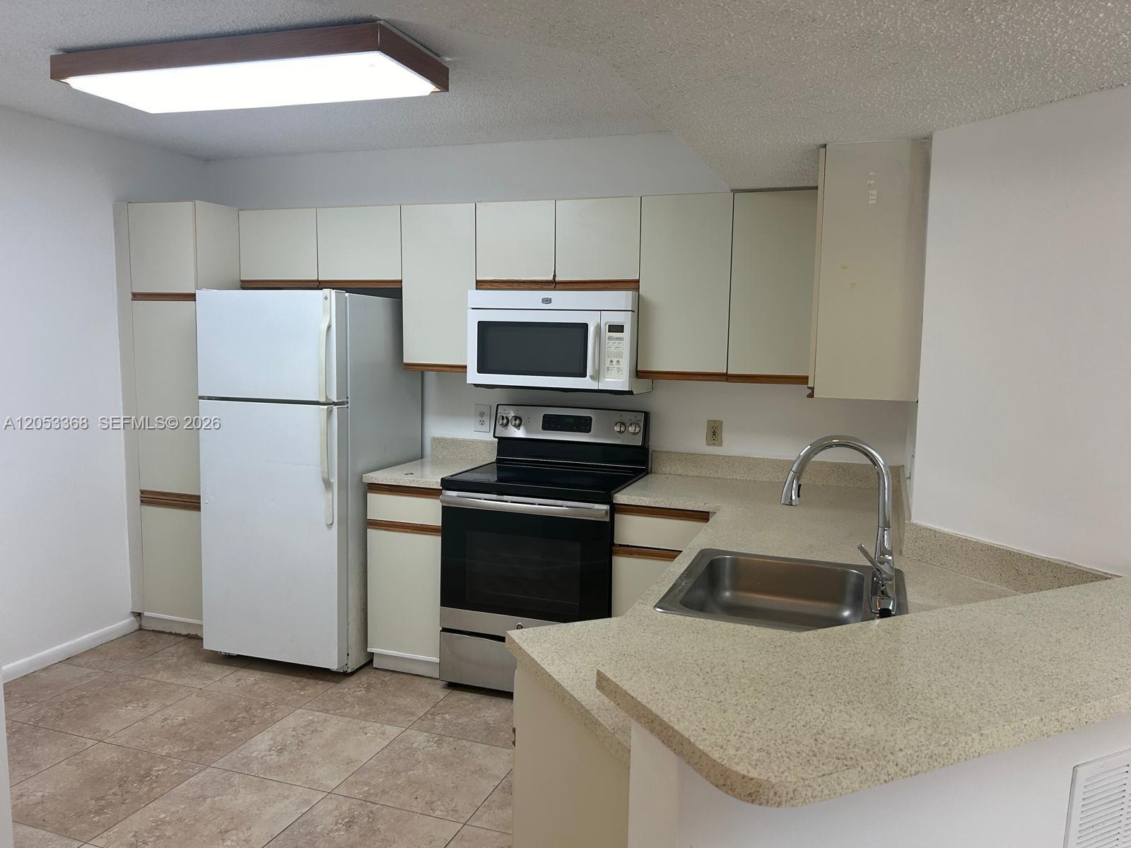 8851 Wiles Rd # 208, Coral Springs FL 33067 photo 4