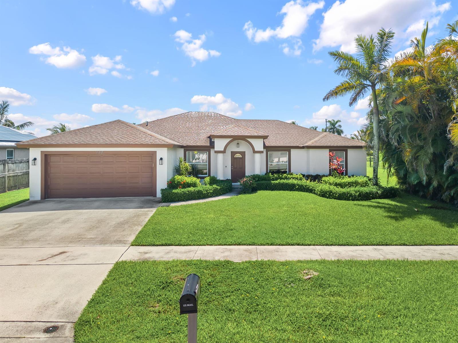 111 Meadow Woode Drive, Royal Palm Beach FL 33411