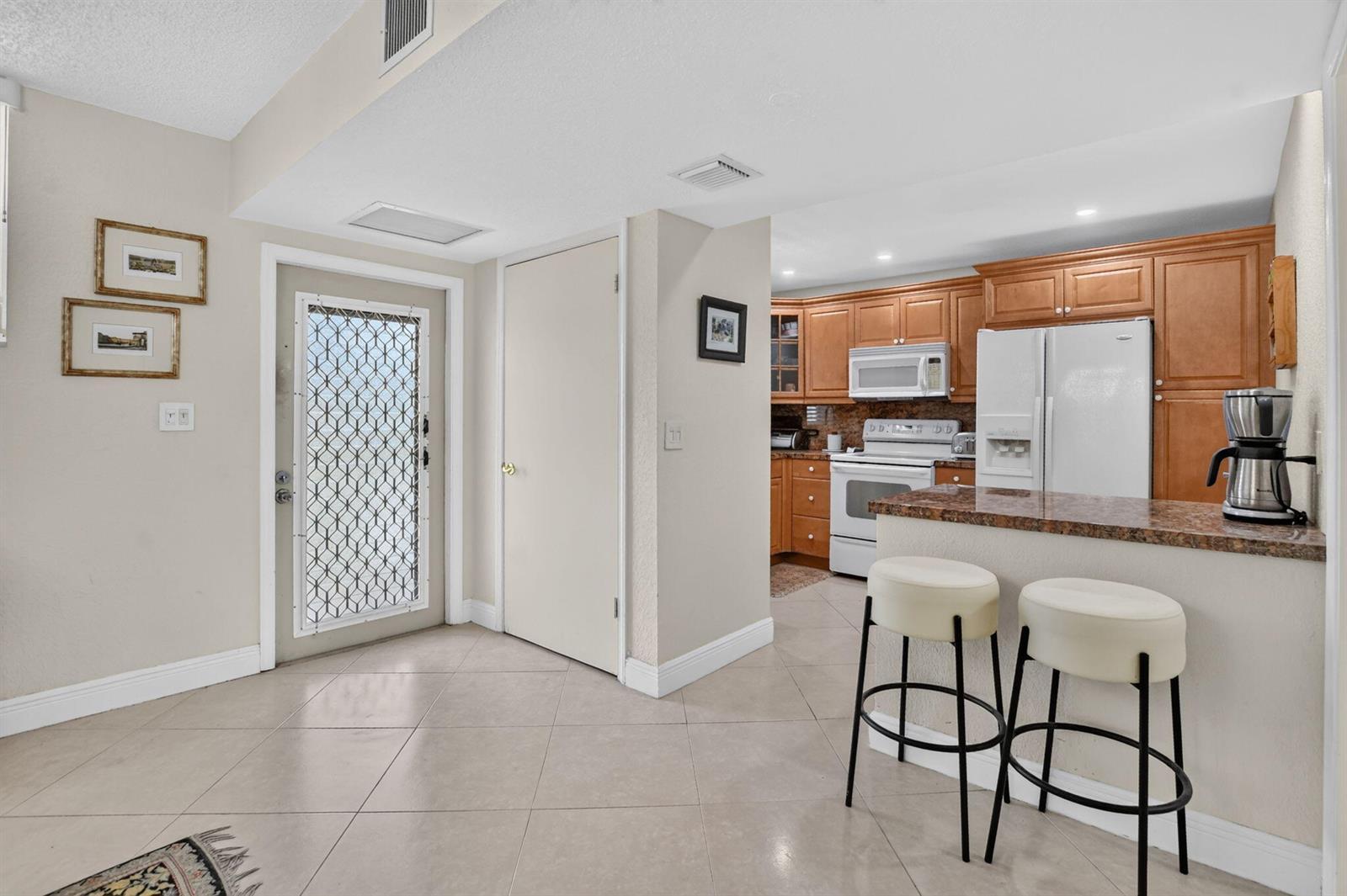 2460 DEER CREEK COUNTRY CLUB Boulevard # A, Deerfield Beach FL 33442 photo 3