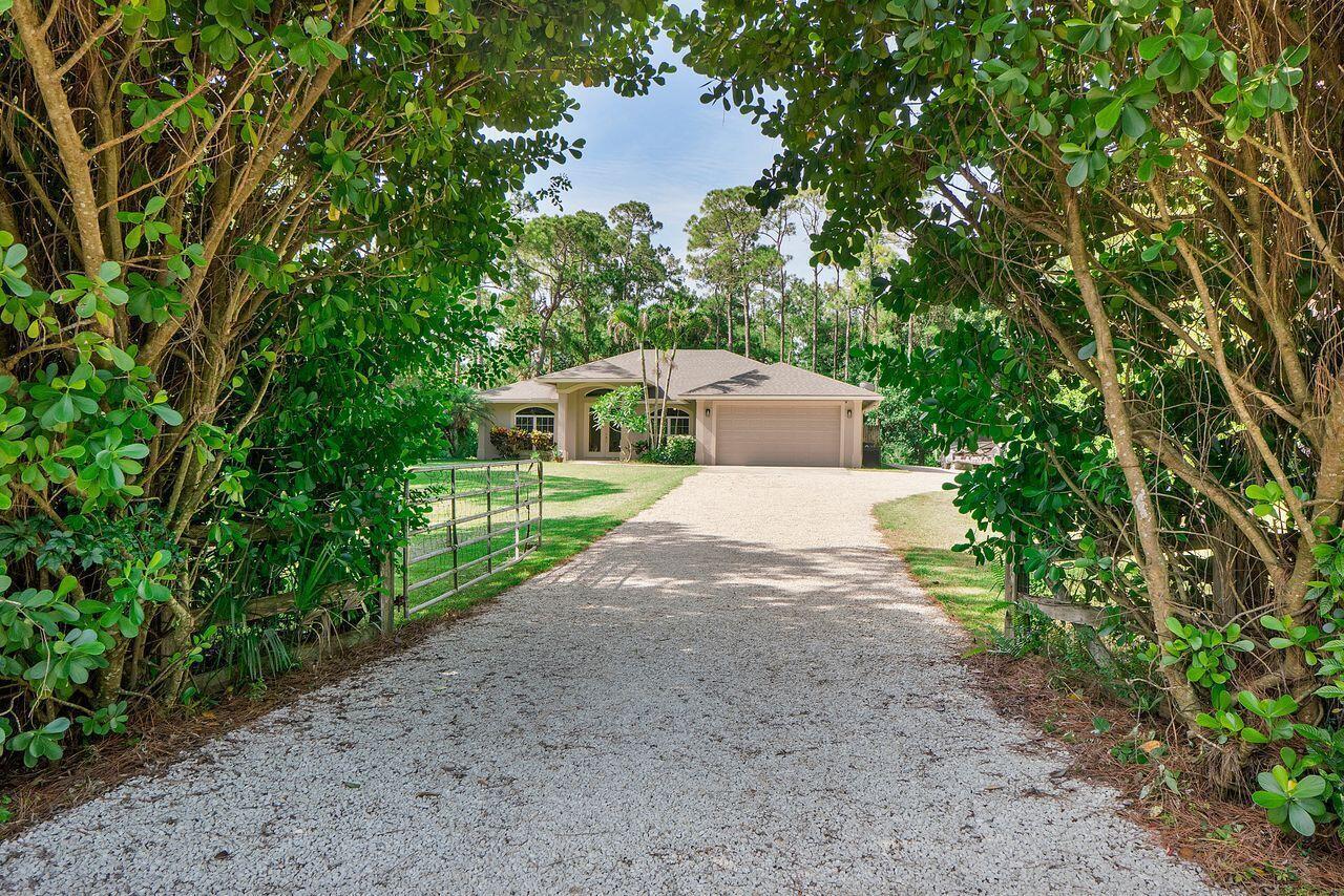 9608 Mockingbird Trail, FL 33478 photo 2