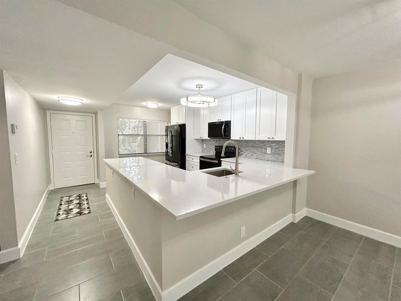 7681 Tahiti Lane # 102, Lake Worth FL 33467