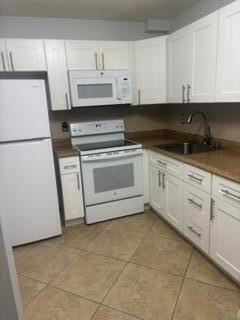 600 VILLAGE GREEN Court # 220, Palm Springs FL 33461