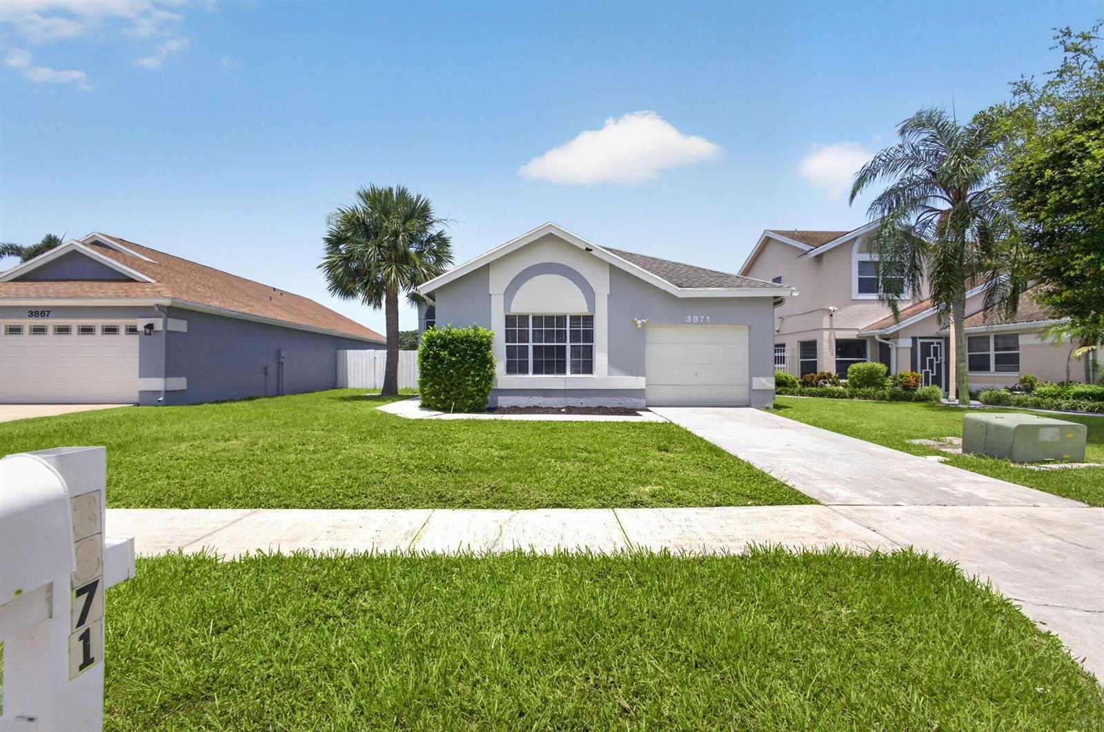 3871 Circle Lake Drive, West Palm Beach FL 33417 photo 2