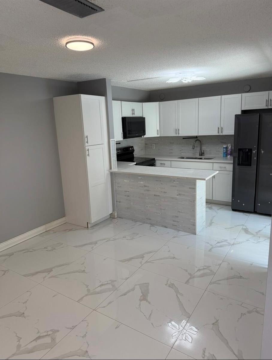 232 WOODLAND Road, Palm Springs FL 33461 photo 3