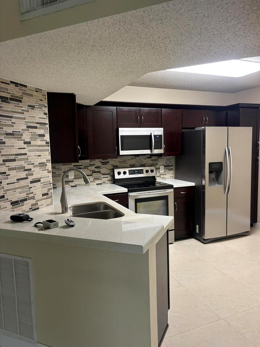 8761 WILES Road # 304, Coral Springs FL 33067 photo 2