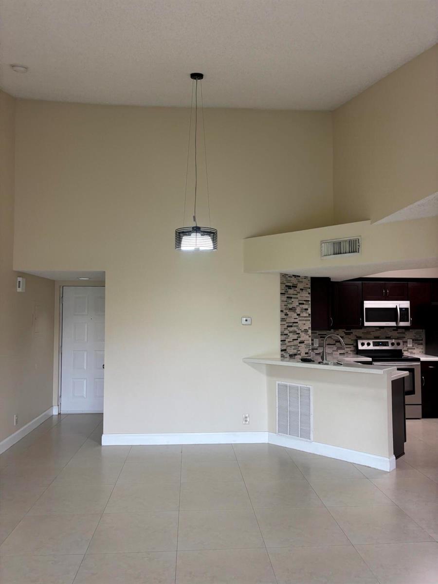 8761 WILES Road # 304, Coral Springs FL 33067 photo 4