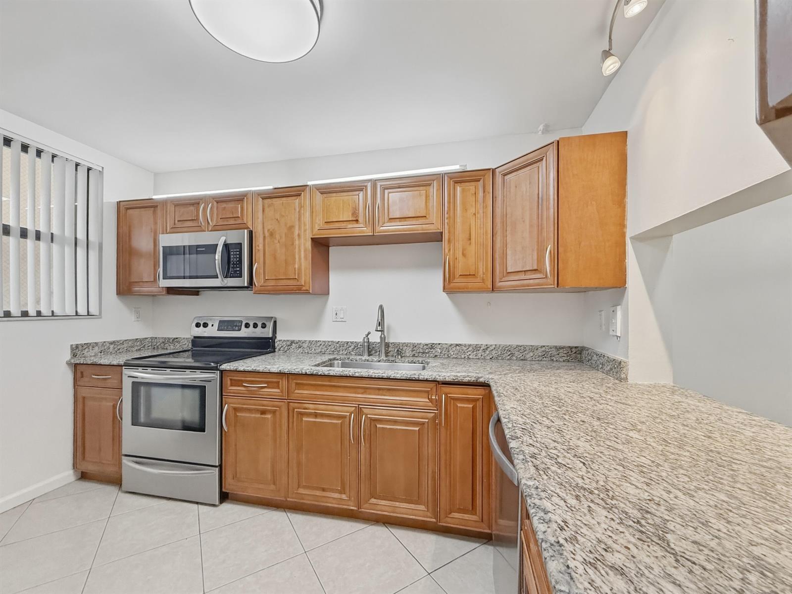 8437 Forest Hills Drive # 207, Coral Springs FL 33065 photo 2