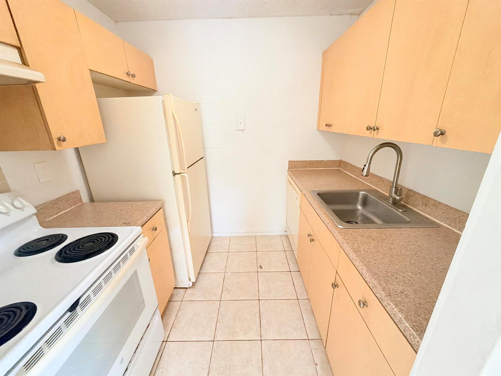 1089 N BENOIST FARMS Road # 102, West Palm Beach FL 33411