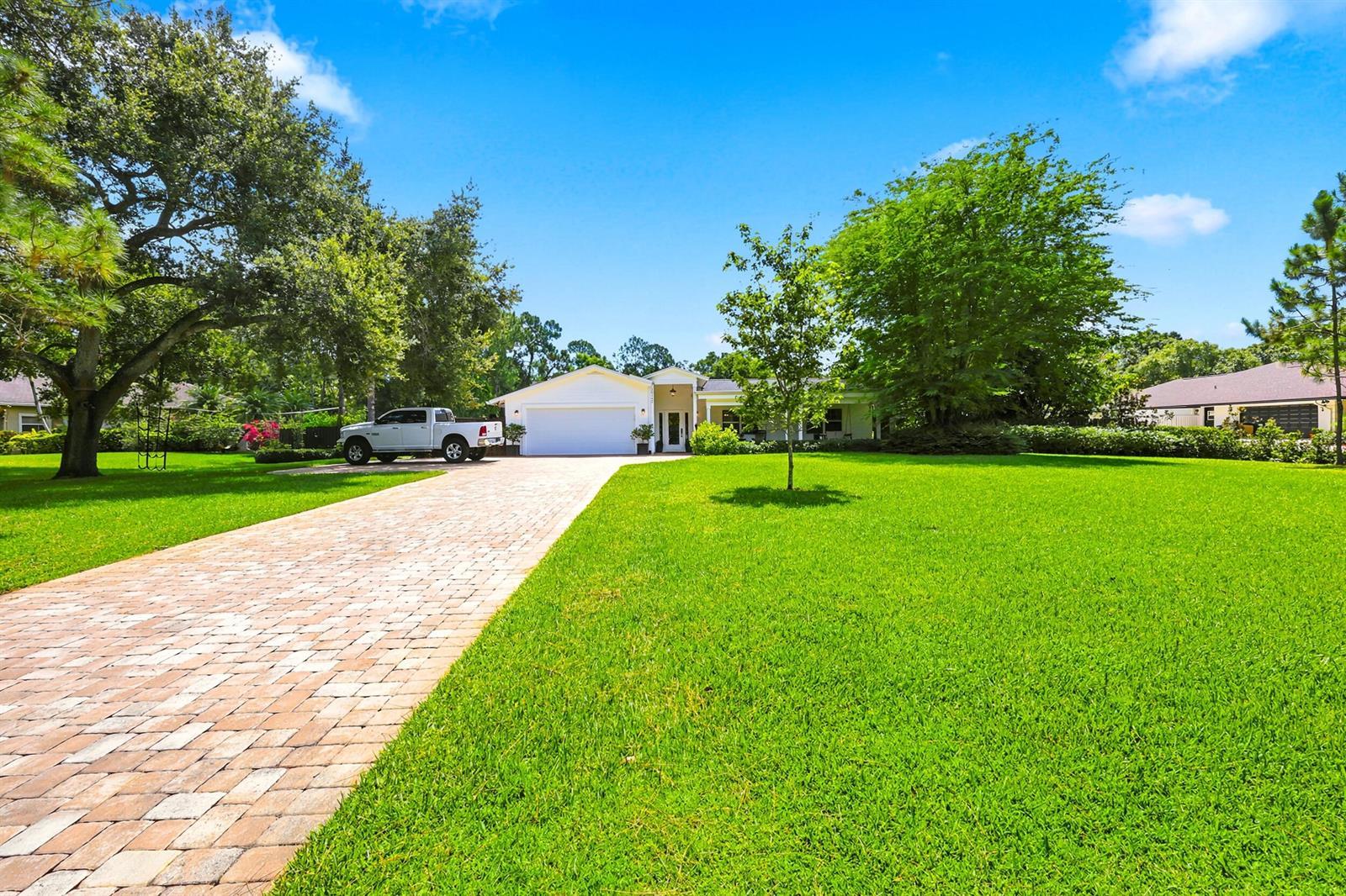 10142 Trailwood Circle, Jupiter FL 33478