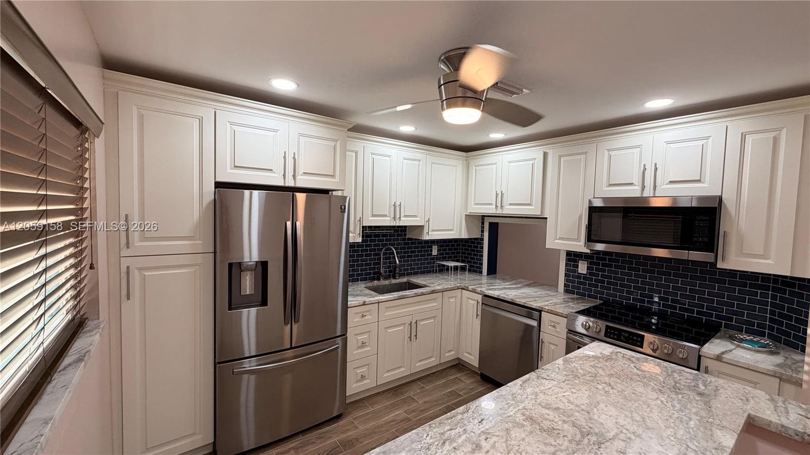 6090 N Sabal Palm Blvd # 311, Tamarac FL 33319 photo 5