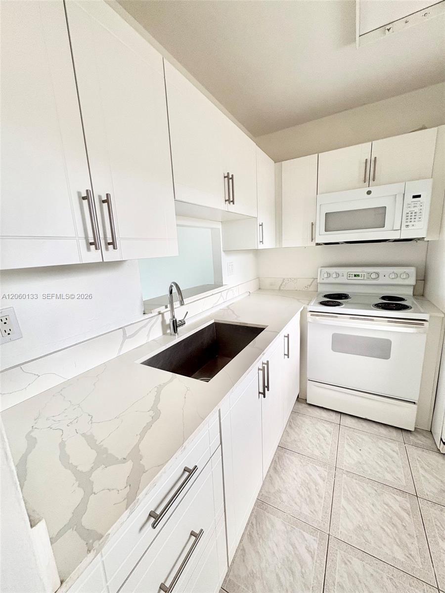 5011 W Oakland Park Blvd # 310, Lauderdale Lakes FL 33313 photo 3