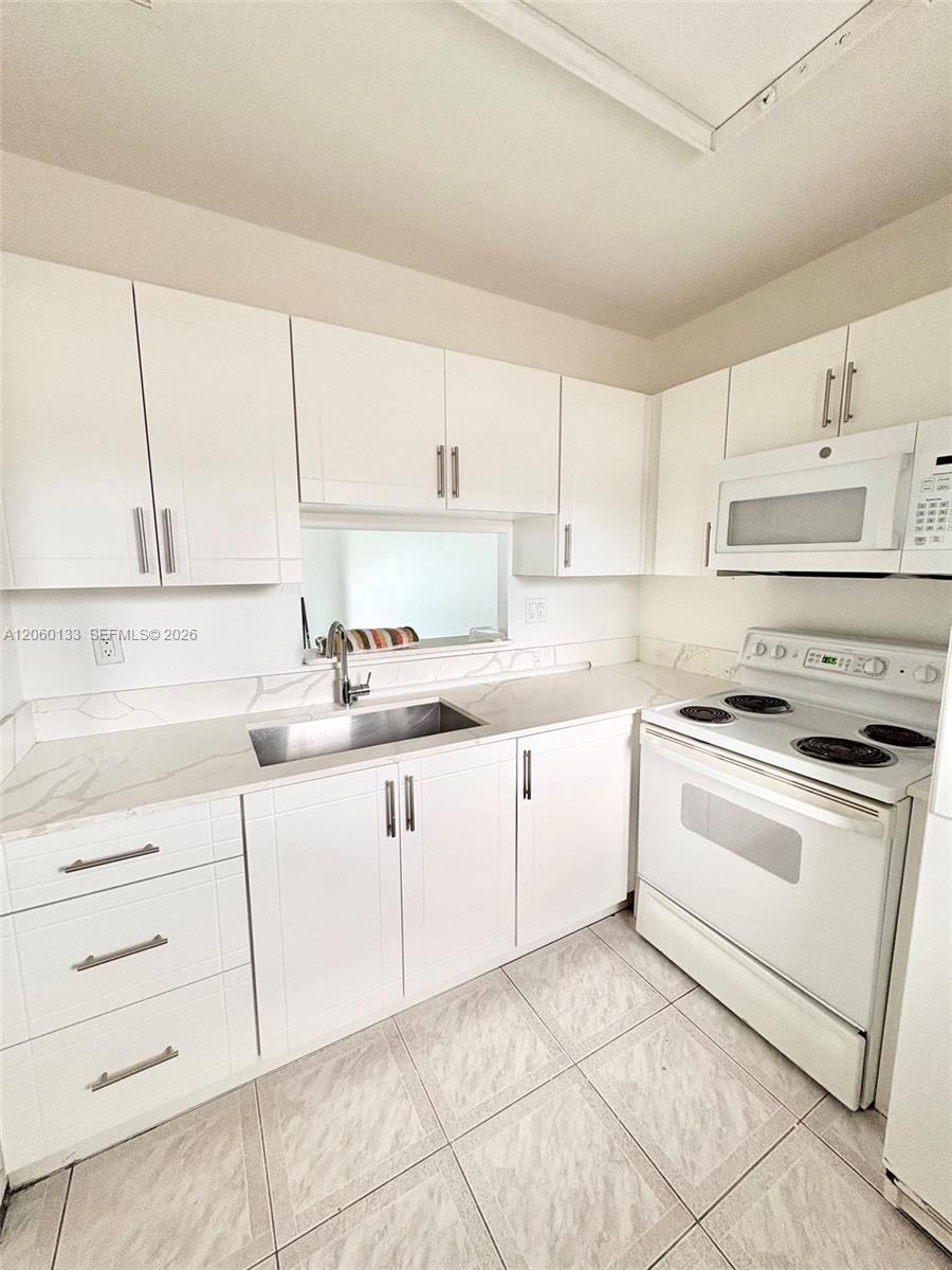 5011 W Oakland Park Blvd # 310, Lauderdale Lakes FL 33313 photo 5