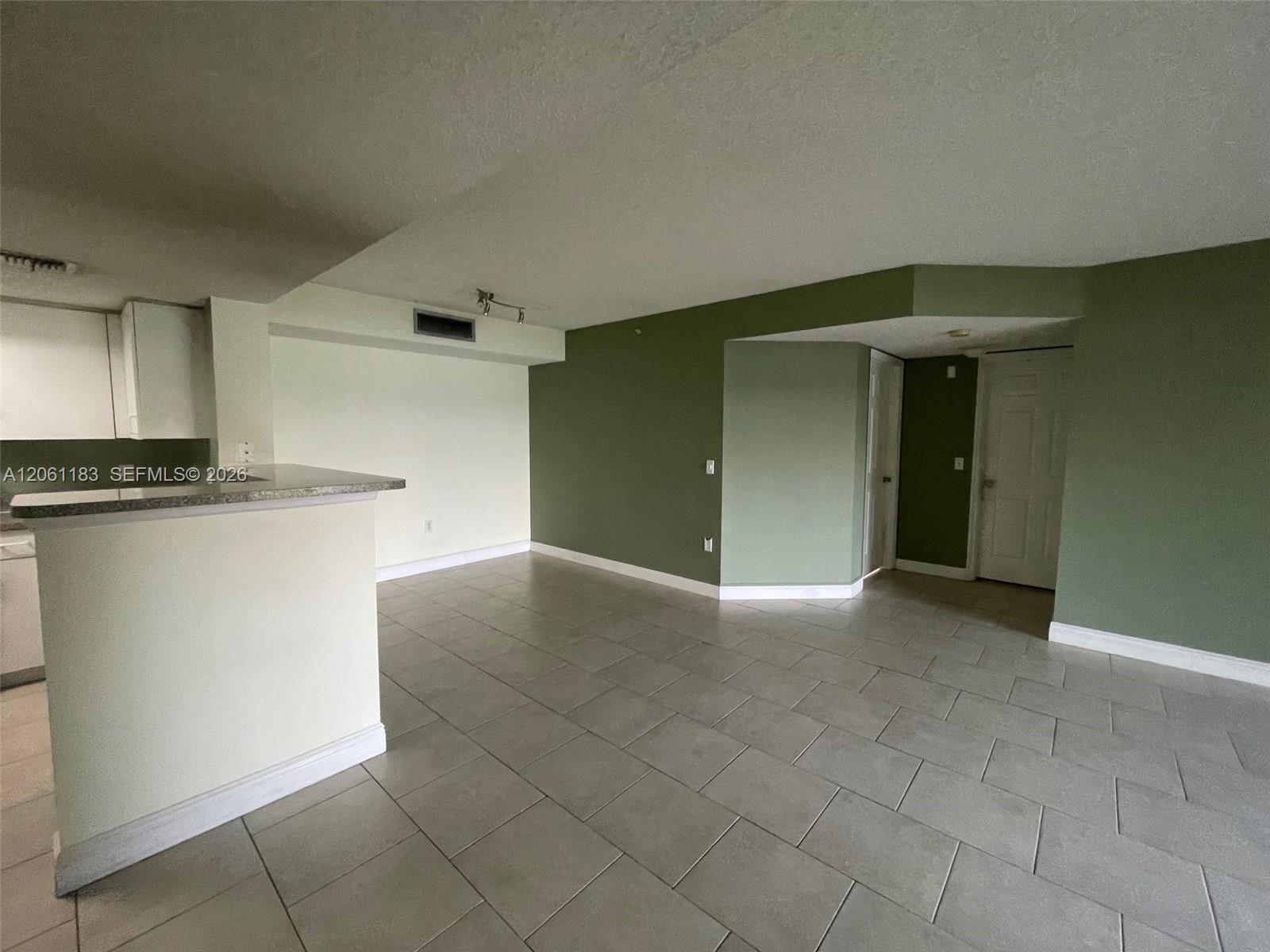 5005 Wiles Rd # 102, Coconut Creek FL 33073 photo 2
