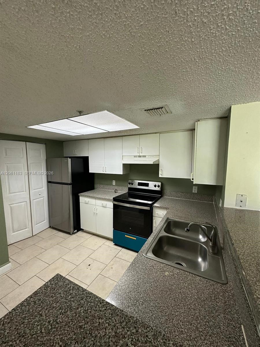 5005 Wiles Rd # 102, Coconut Creek FL 33073 photo 5