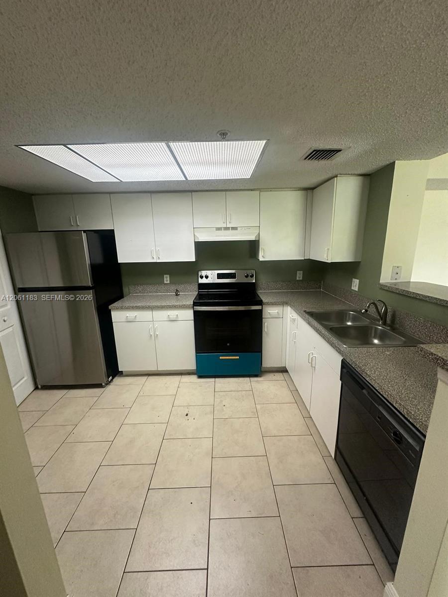 5005 Wiles Rd # 102, Coconut Creek FL 33073 photo 4