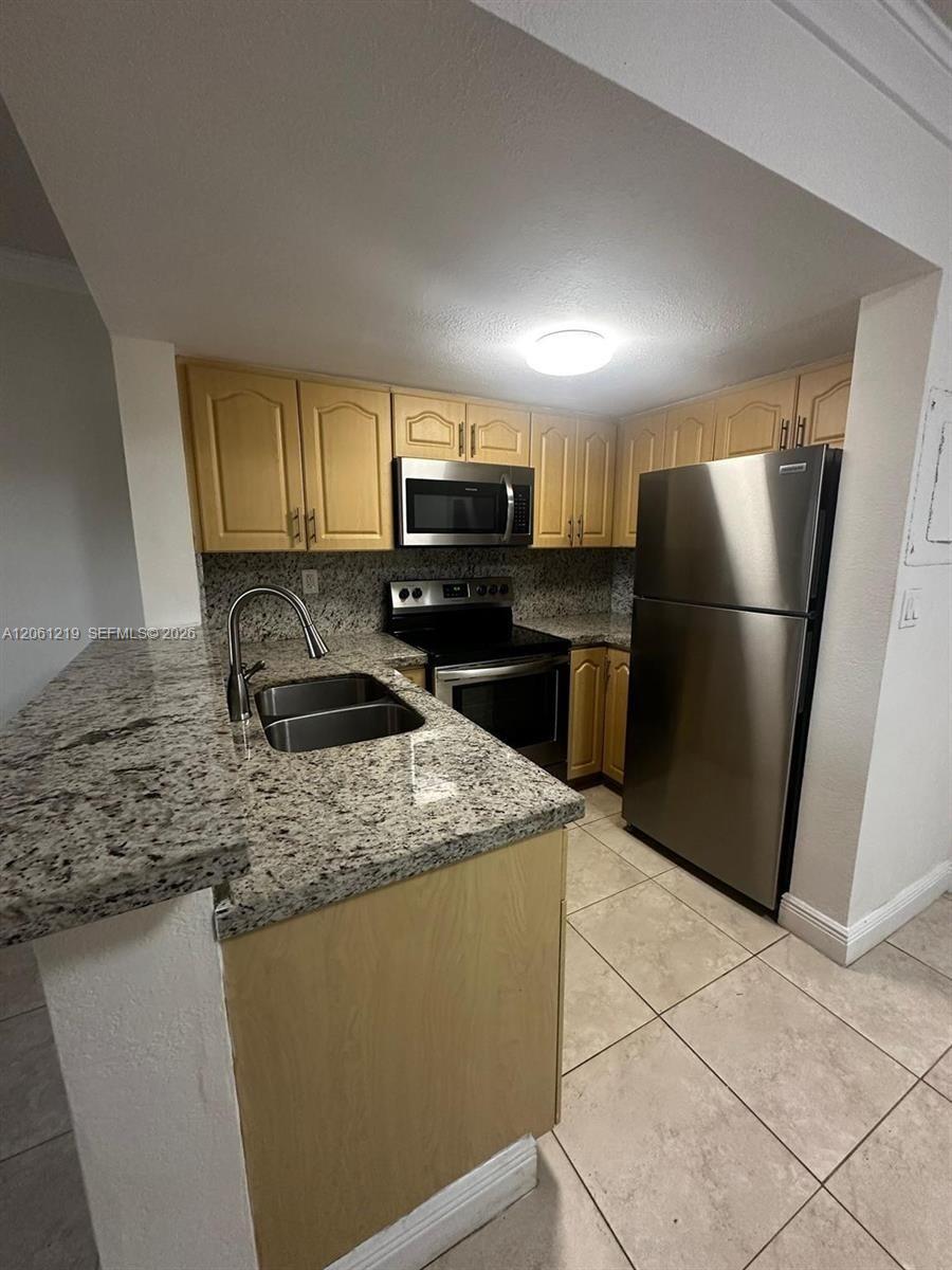 8660 NW 6th Ln # 103, Miami FL 33126 photo 3
