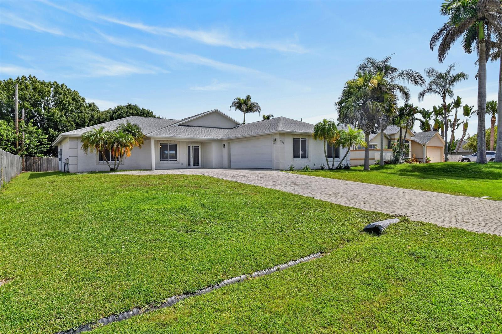 1061 SW BENSCHOP Avenue, Port St. Lucie FL 34953 photo 2