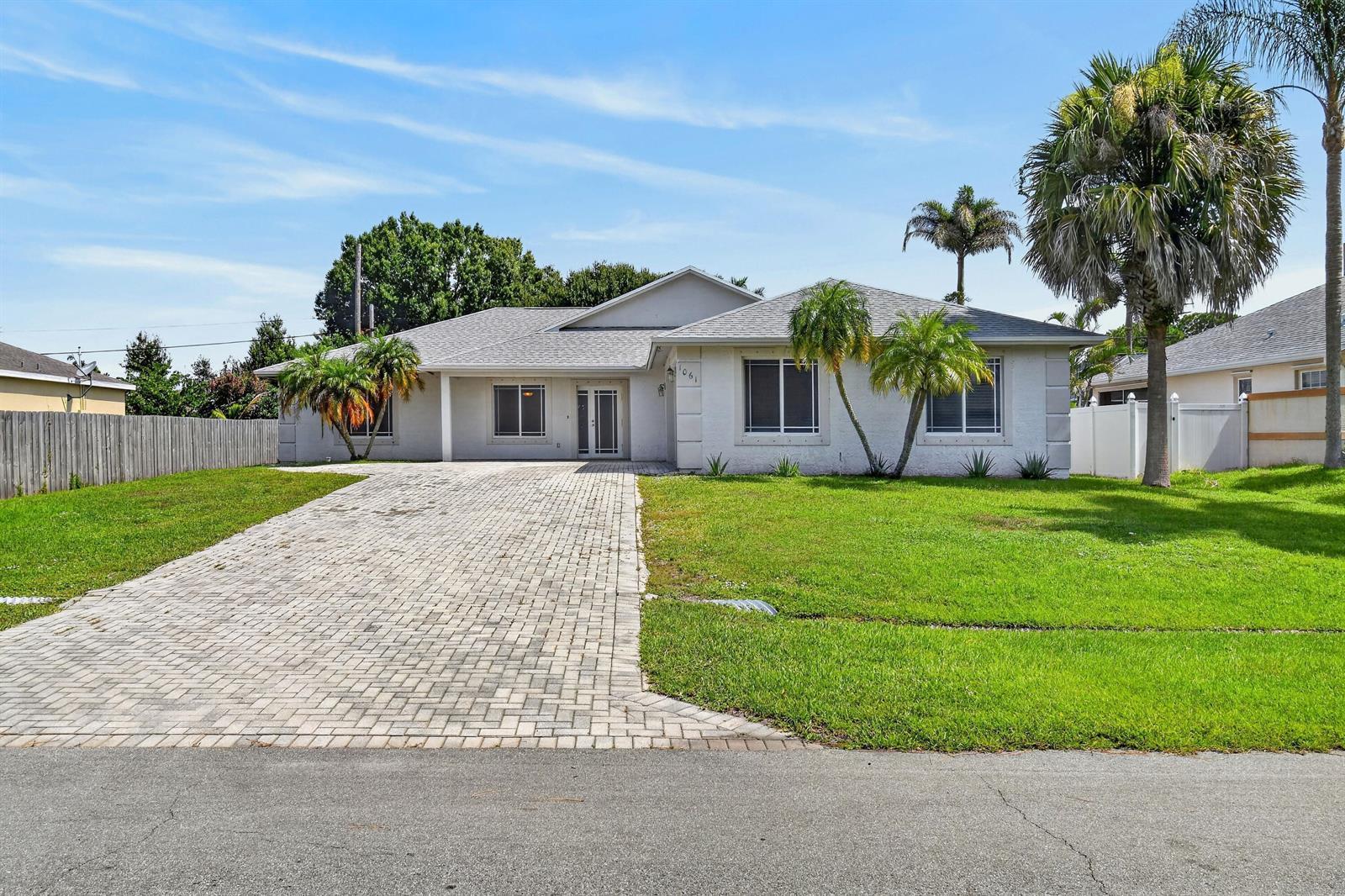 1061 SW BENSCHOP Avenue, Port St. Lucie FL 34953