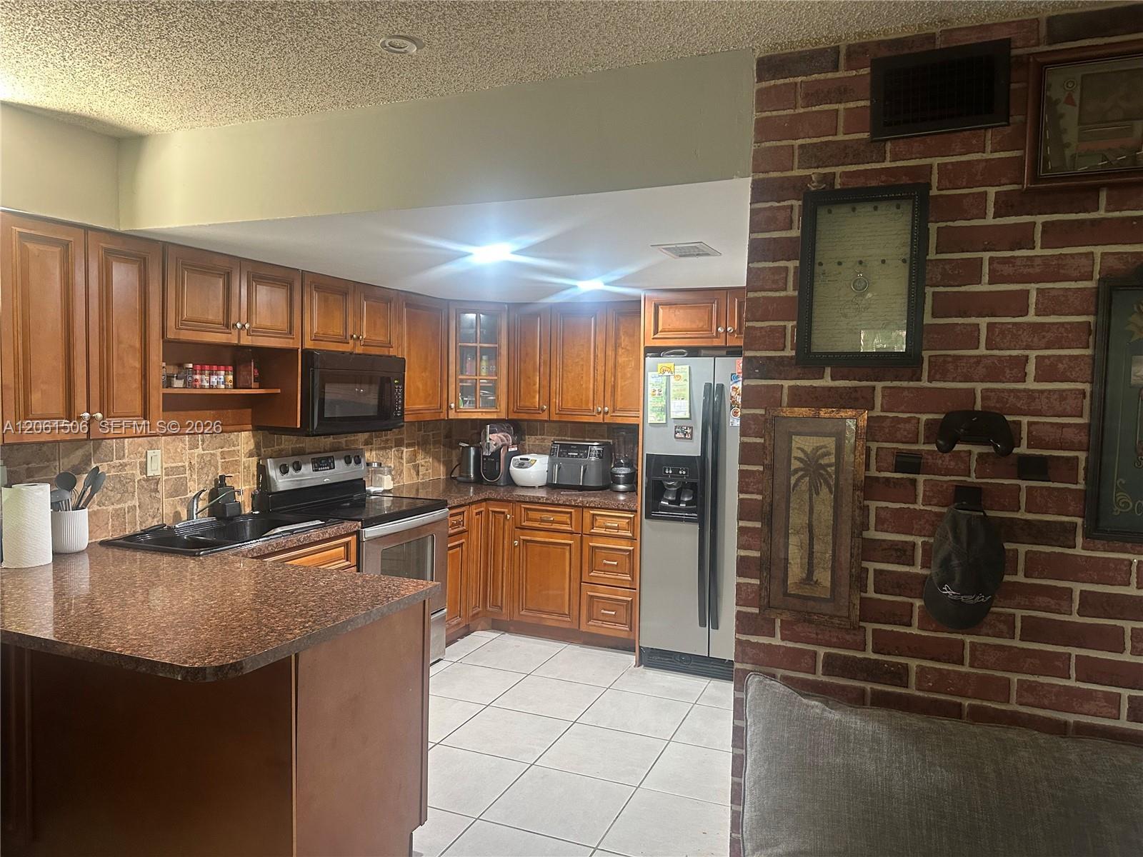 62 Spinning Wheel Ln, Tamarac FL 33319 photo 3