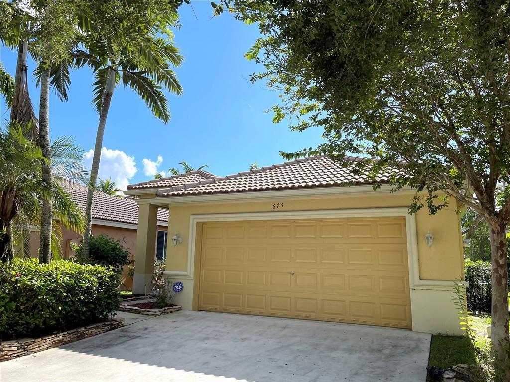 673 CONSERVATION Drive, Weston FL 33327 photo 2
