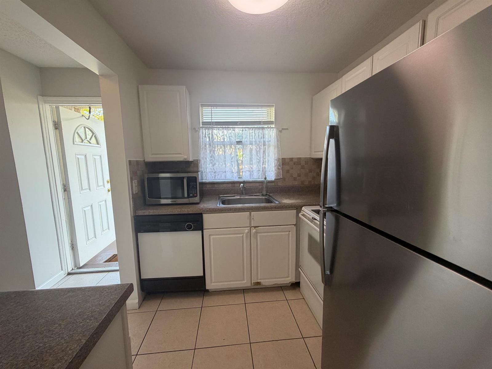 9915 Sandalfoot Boulevard # 410, Boca Raton FL 33428 photo 5