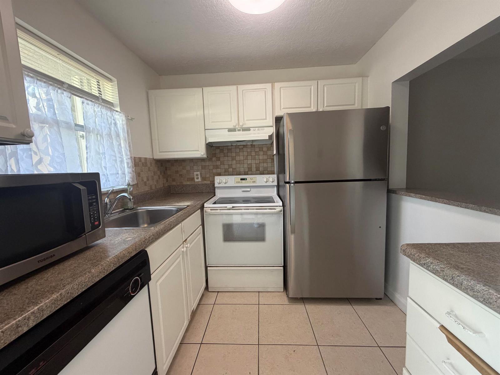 9915 Sandalfoot Boulevard # 410, Boca Raton FL 33428 photo 4