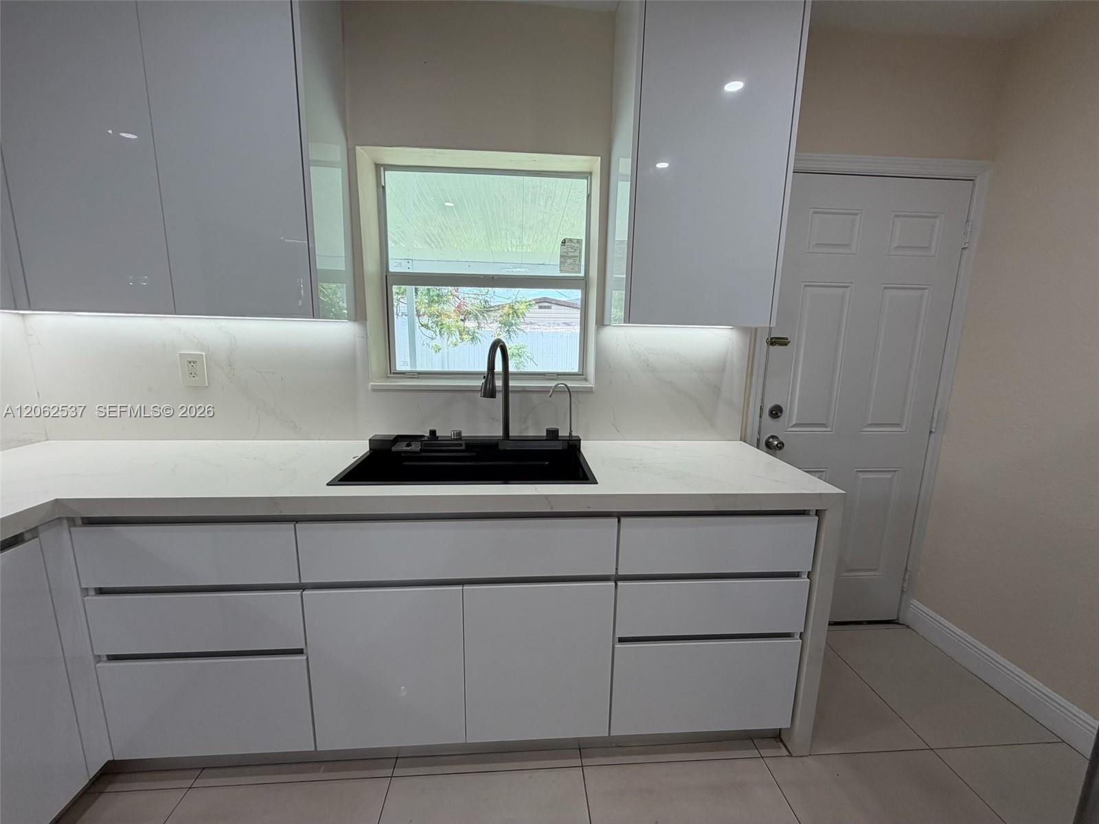 9016 NW 35th Ct, Miami FL 33147 photo 4