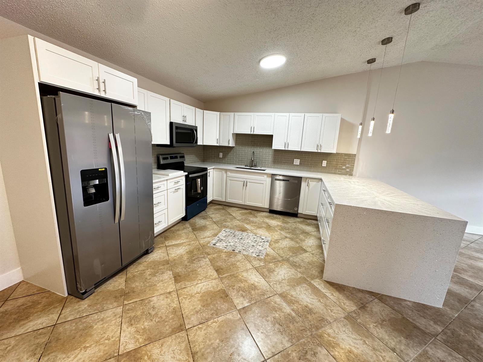 4326 Woodstock Drive # C, West Palm Beach FL 33409 photo 2