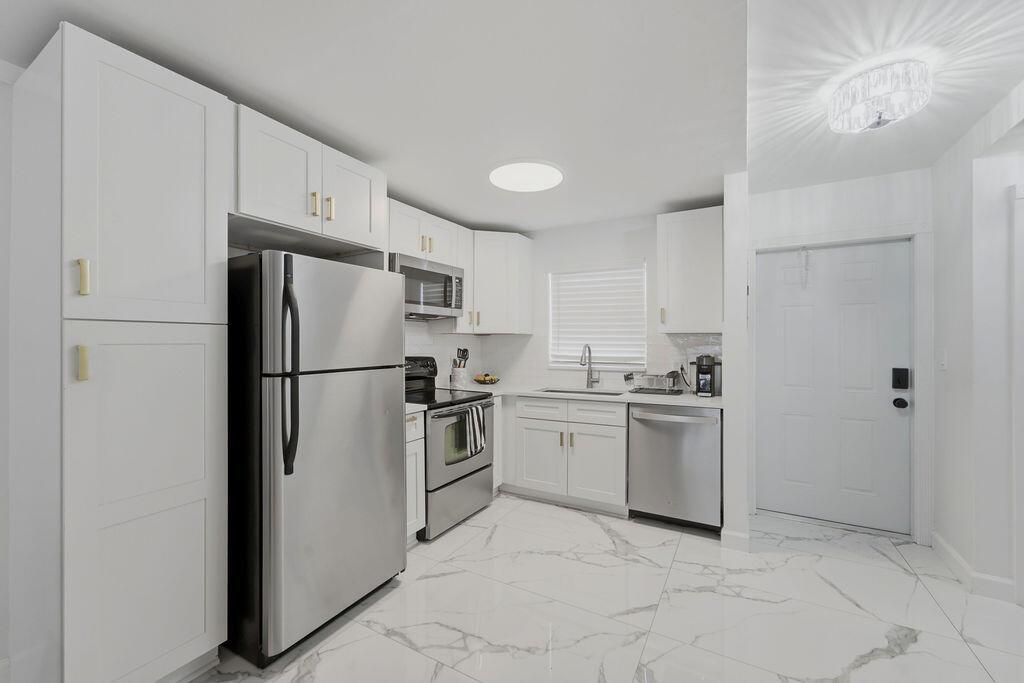 809 W Oakland Park Boulevard # K2, Oakland Park FL 33311 photo 2
