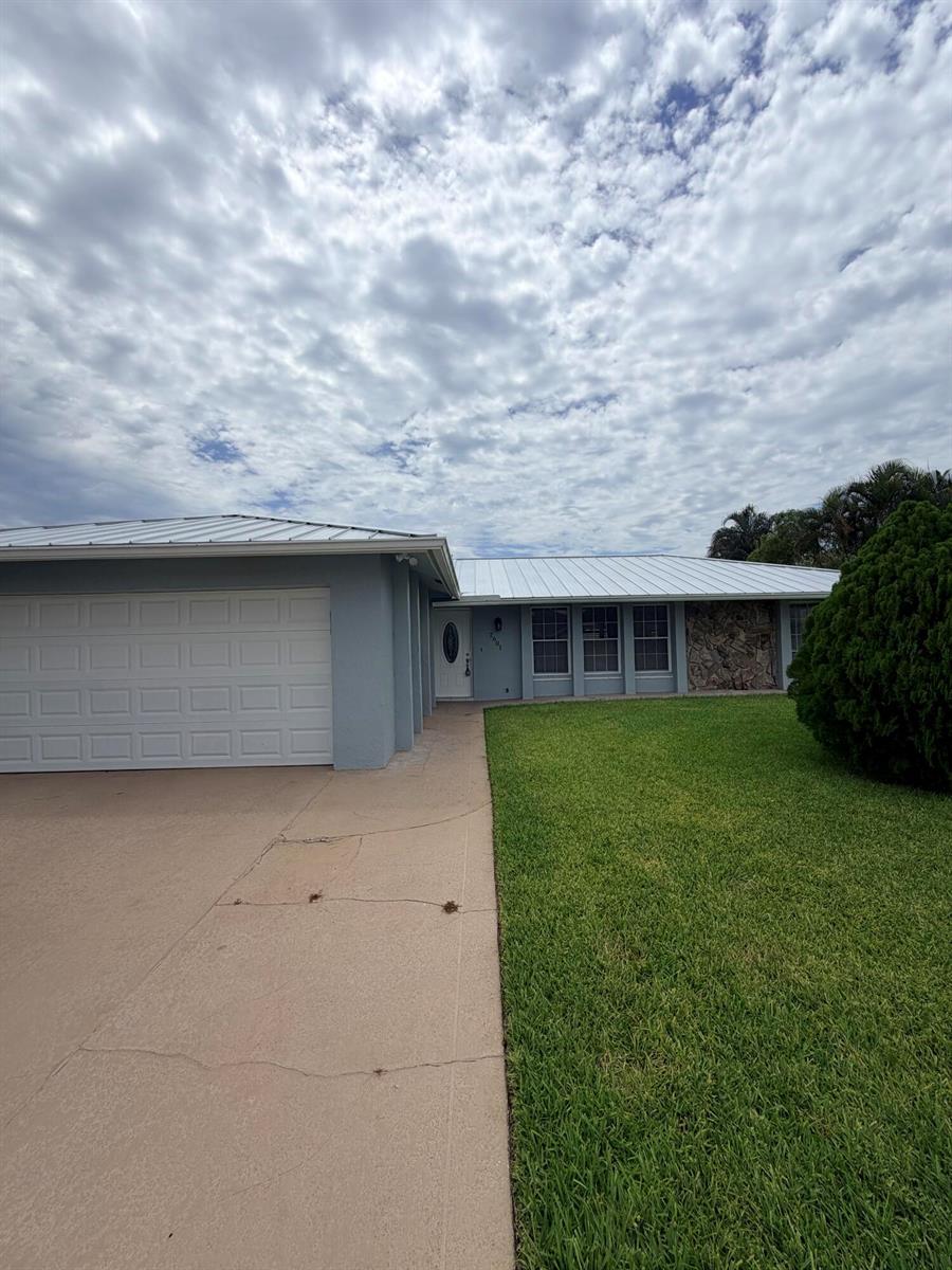 2601 W CARANDIS Road, West Palm Beach FL 33406