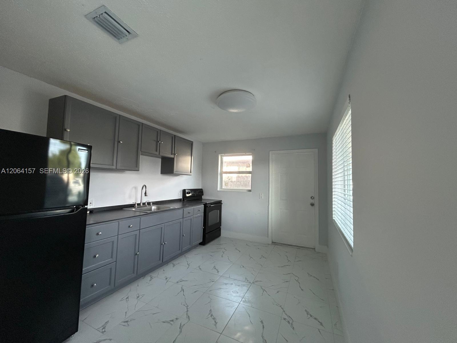 3177 NW 29th St # A, Miami FL 33142 photo 3