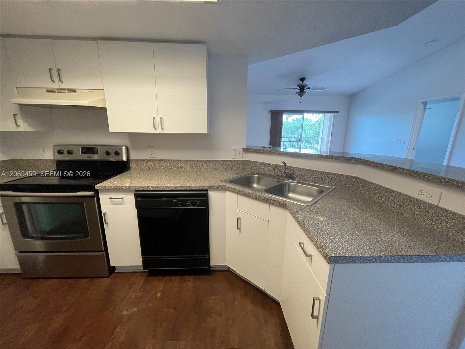 5025 Wiles Rd # 303, Coconut Creek FL 33073 photo 3