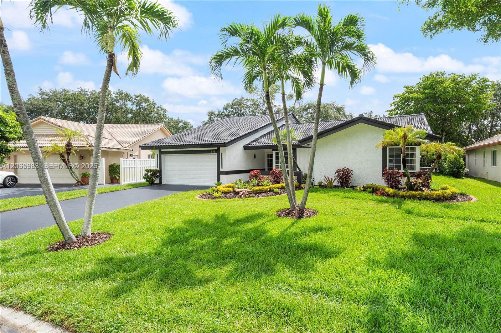 695 NW 107th Ln, Coral Springs FL 33071 photo 2