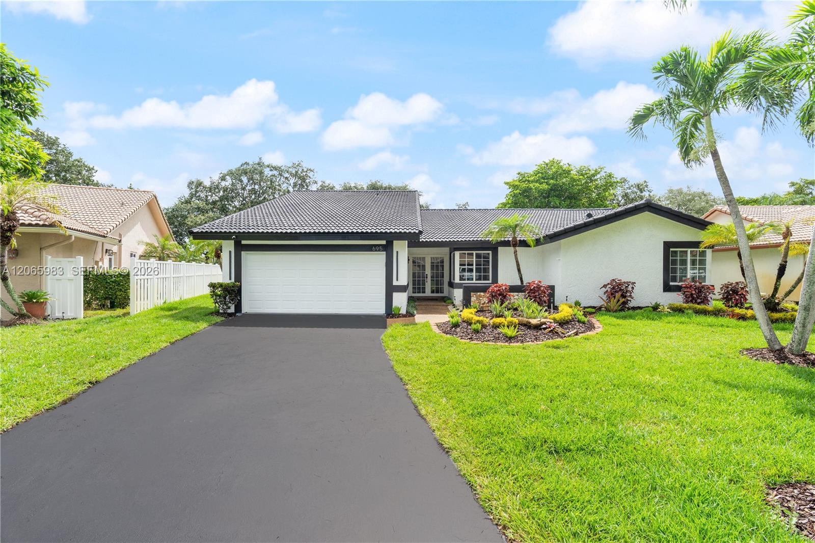 695 NW 107th Ln, Coral Springs FL 33071