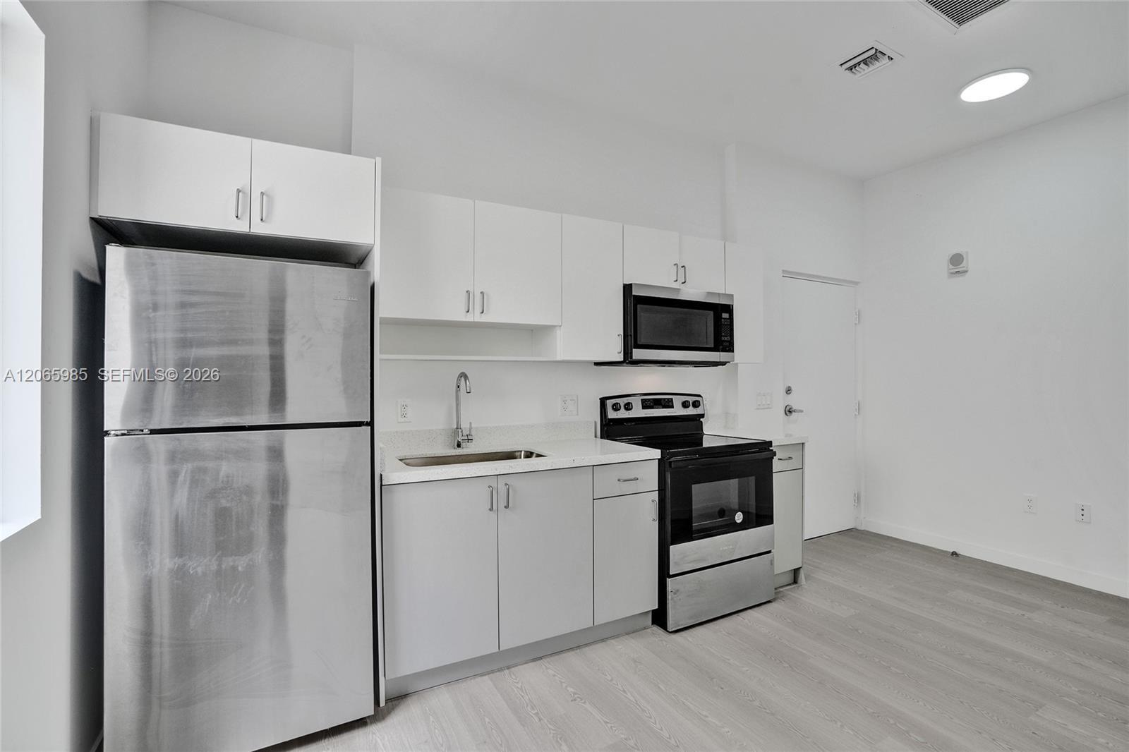 1567 NW 1st St # 14, Miami FL 33125 photo 2