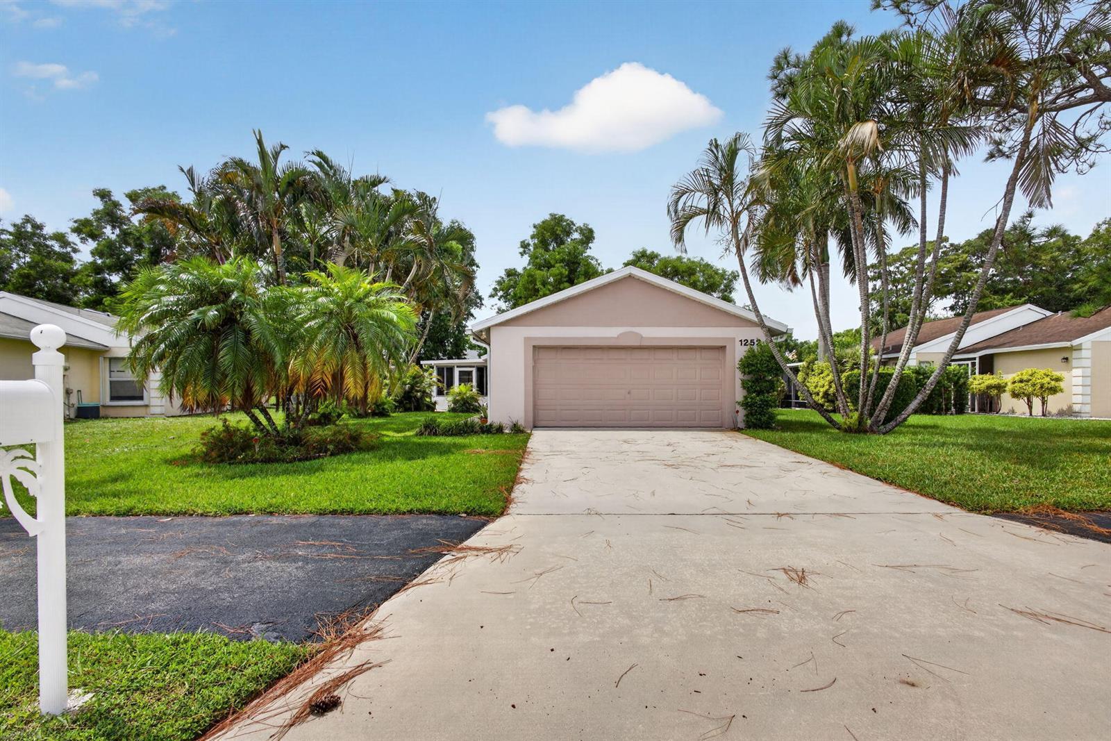 1252 PINE SAGE Circle, West Palm Beach FL 33409