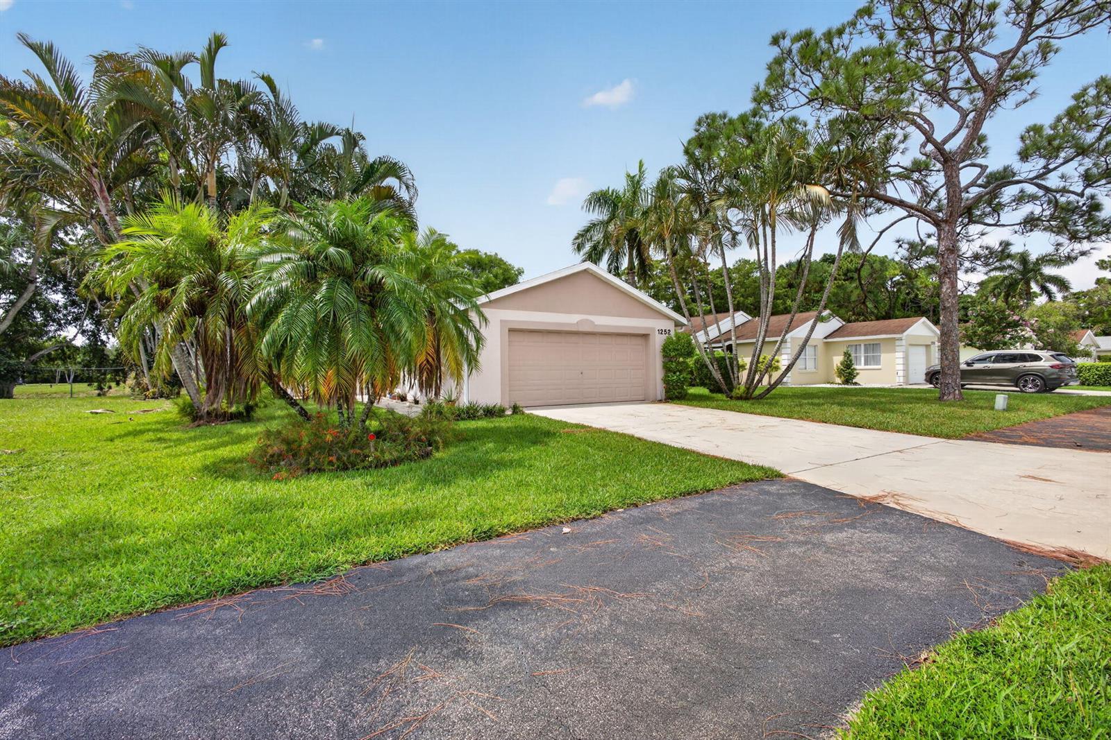 1252 PINE SAGE Circle, West Palm Beach FL 33409 photo 4