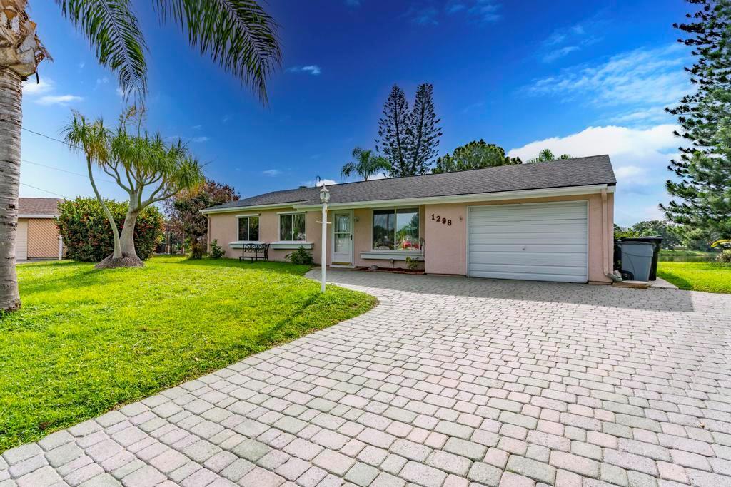 1298 SE RICKENBACKER Terrace, Port St. Lucie FL 34952 photo 2