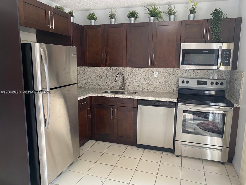 560 NW 82nd Pl # 305, Miami FL 33126 photo 2