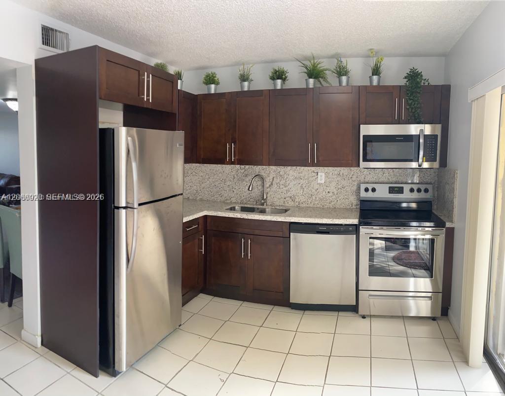 560 NW 82nd Pl # 305, Miami FL 33126 photo 3
