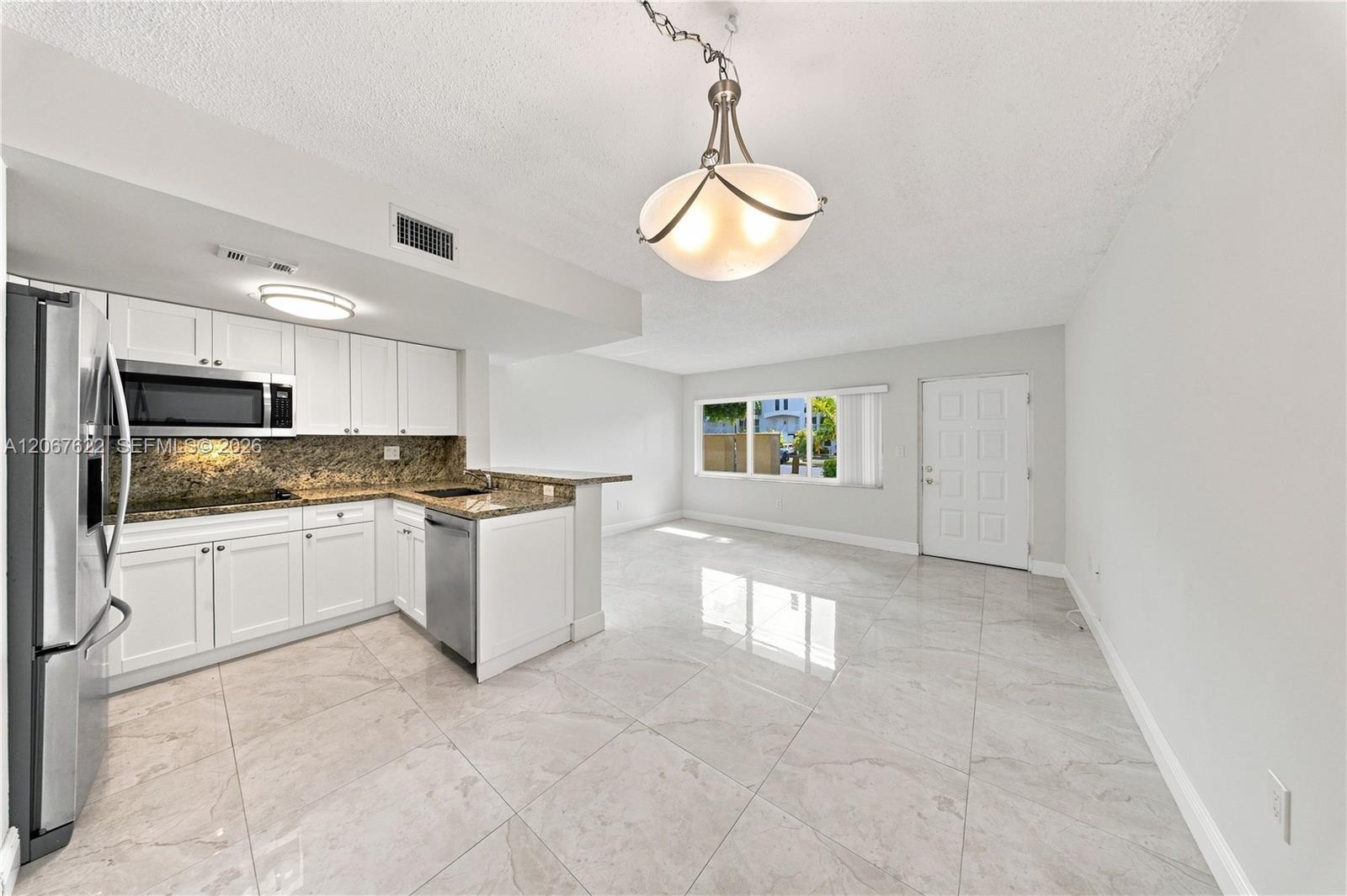 670 NW 85th Pl # 104, Miami FL 33126 photo 2
