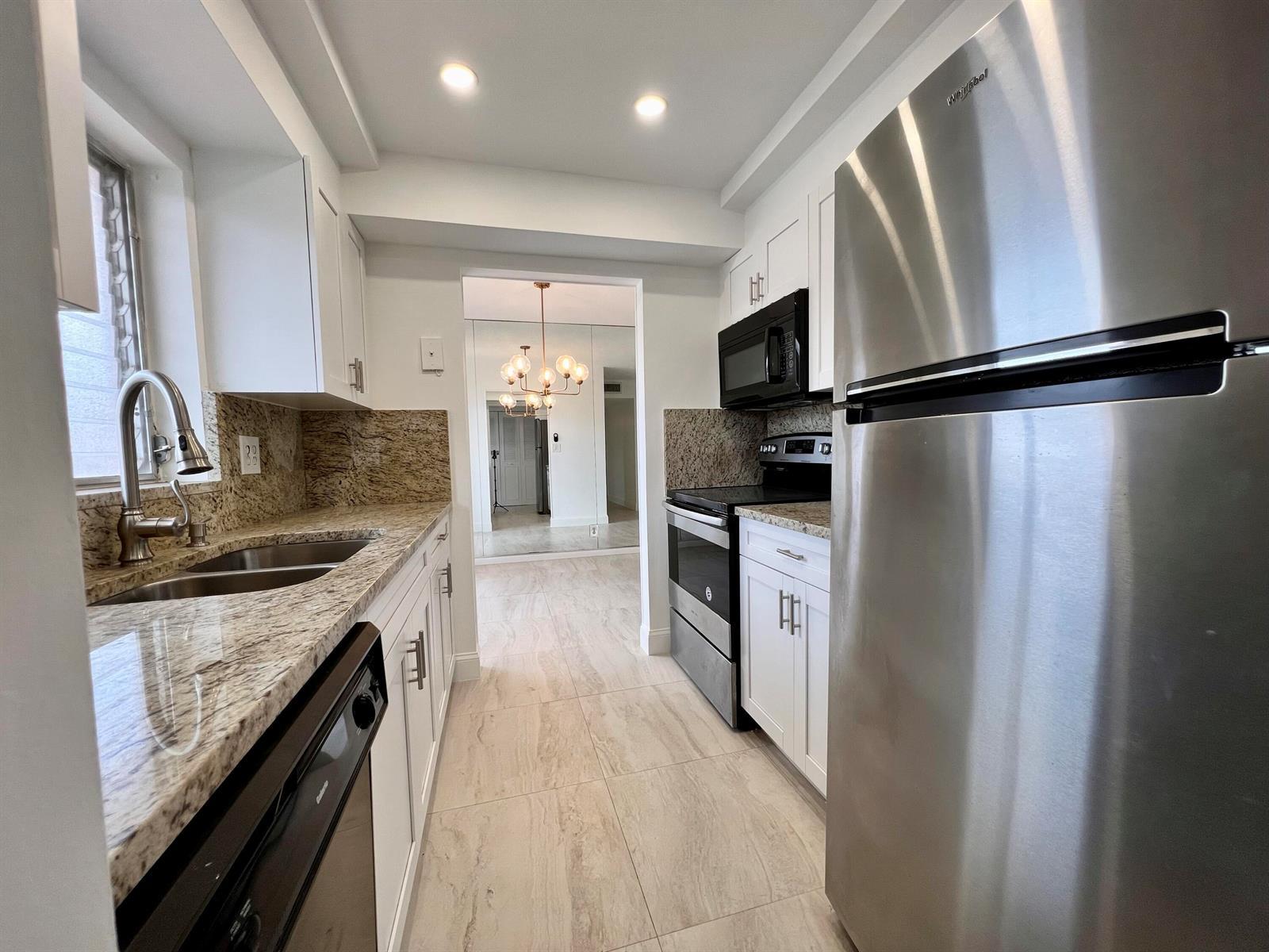 3 Golfs Edge # A, West Palm Beach FL 33417 photo 2