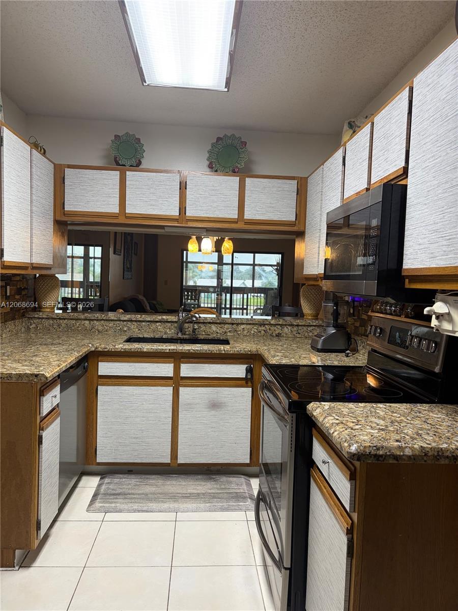 9830 W Mcnab Rd # 208, Tamarac FL 33321 photo 3