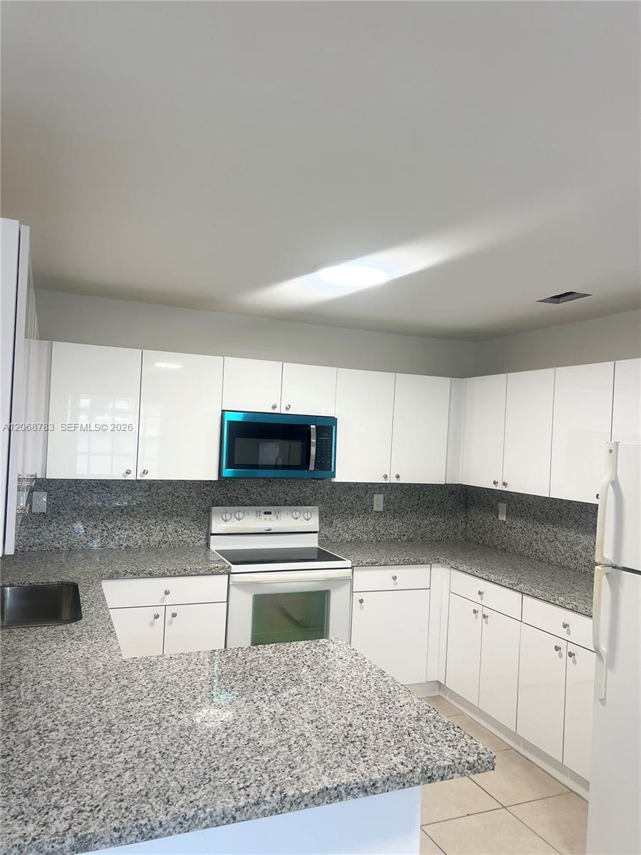1244 NW 32nd Pl # 1244, Miami FL 33125 photo 3
