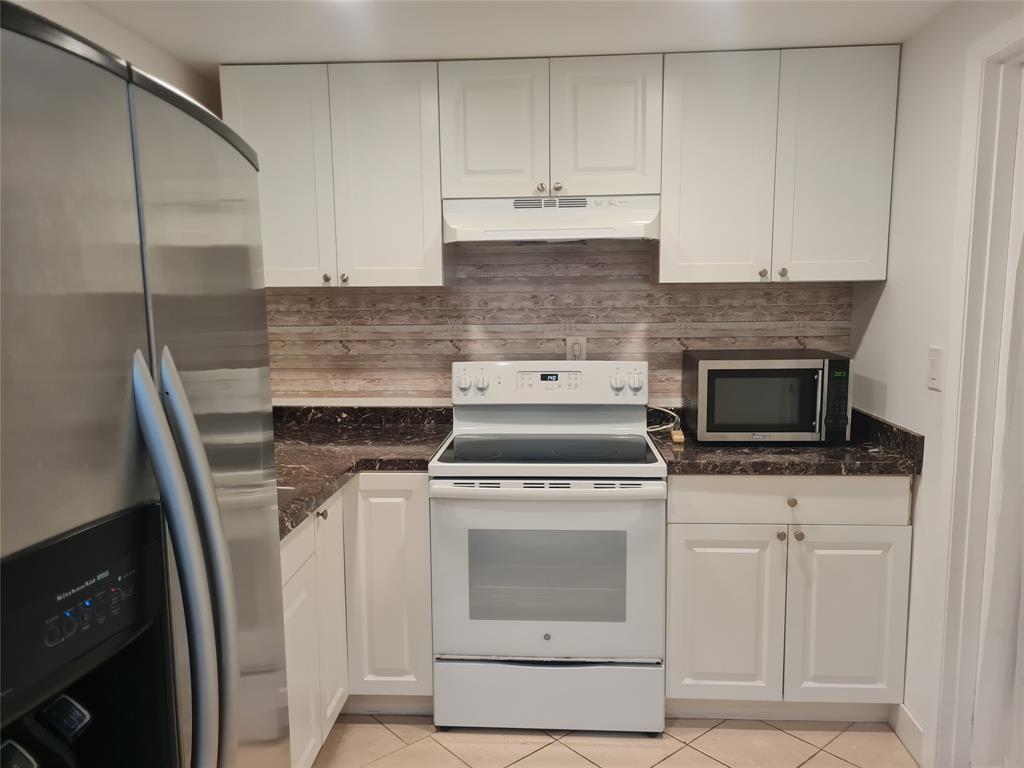 300 Golden Isles Drive # 104, Hallandale Beach FL 33009 photo 3