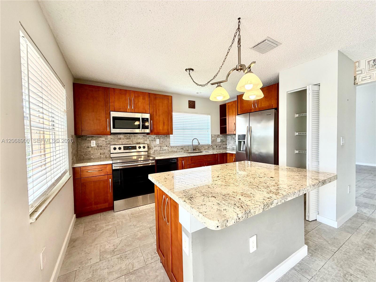 12614 NW 12th Ct, Sunrise FL 33323 photo 3