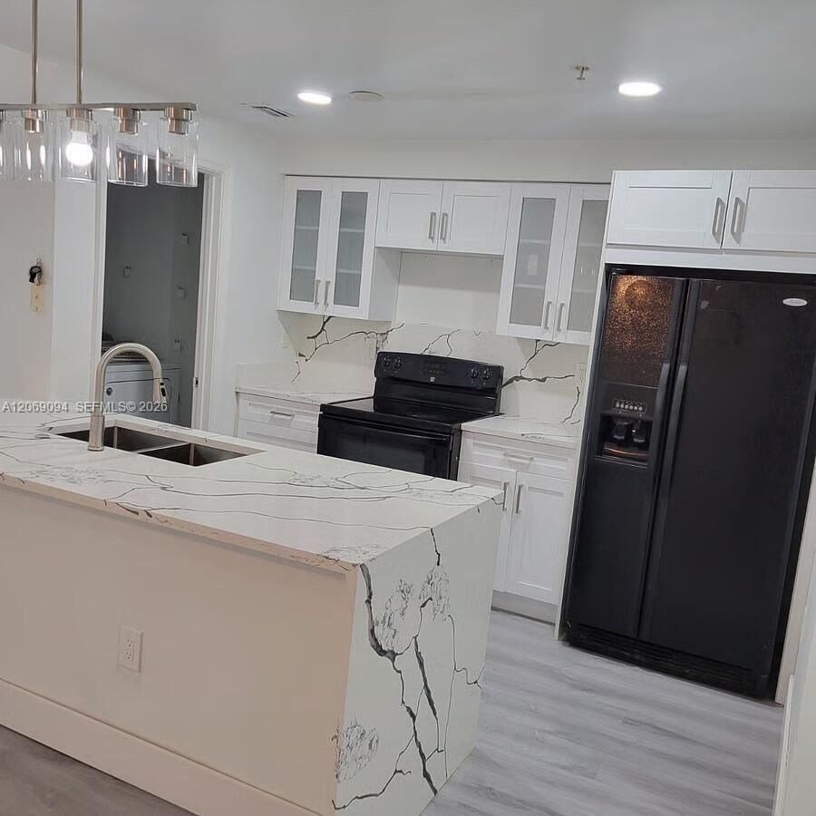 5840 W Sample Rd # 302, Coral Springs FL 33067 photo 2
